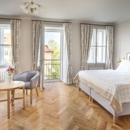 Hotel At The Golden Scissors Praga